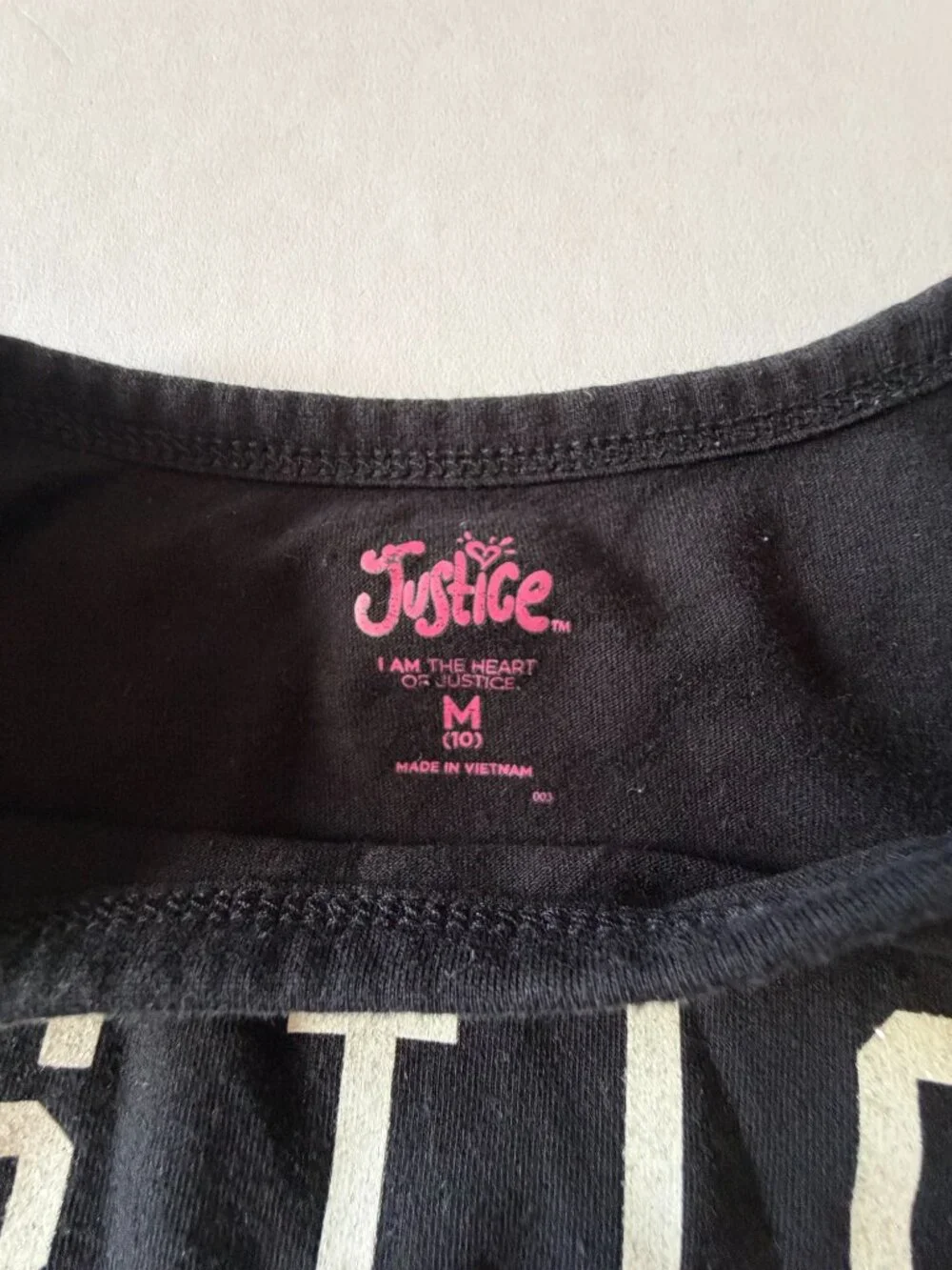 Justice black cropped short sleeve t-shirt, iridescent logo and numbers, Medium